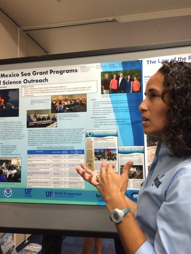 monica wilson presenting a poster at the 2015 Florida Sea Grant Coastal Science Symposium