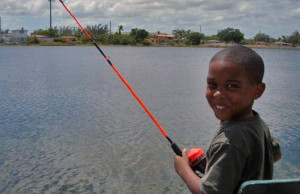 Through fishing, Mahogany Youth gives youngsters a positive environment where they learn life skills. Mahogany Youth photo.