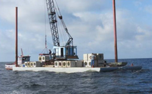 reef materials on barge for deployment